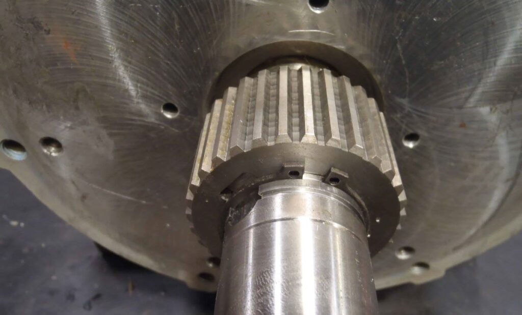 Describes a spur gear on the shaft used as spline for electric motor brake